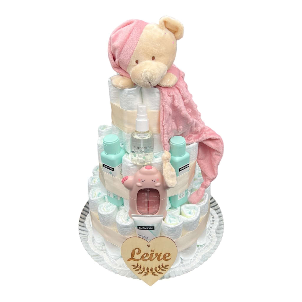 Tarta de pañales para niña con productos Suavinex y osito doudou. Ideal para regalar en nacimientos.