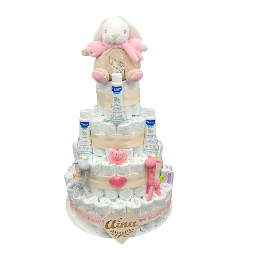 Tarta de pañales niña con mustela para regalar en nacimientos